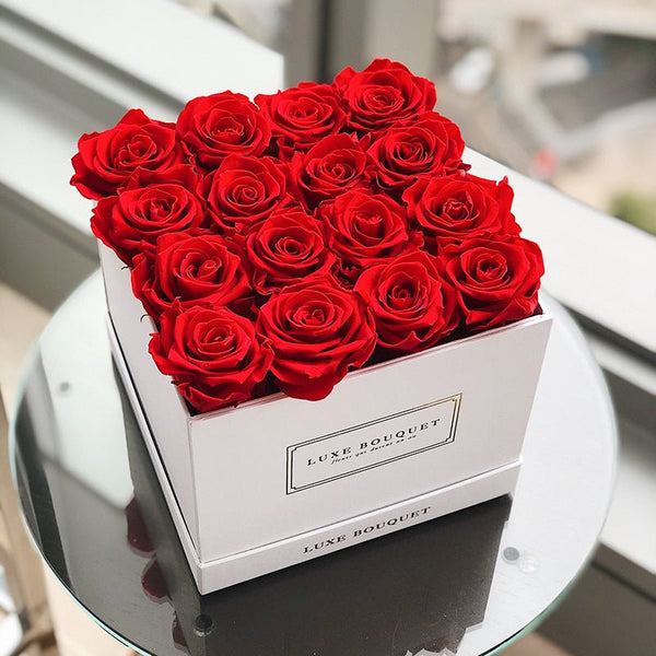 16 Red Roses In A Square Gift Box. by VIP Floral Designs